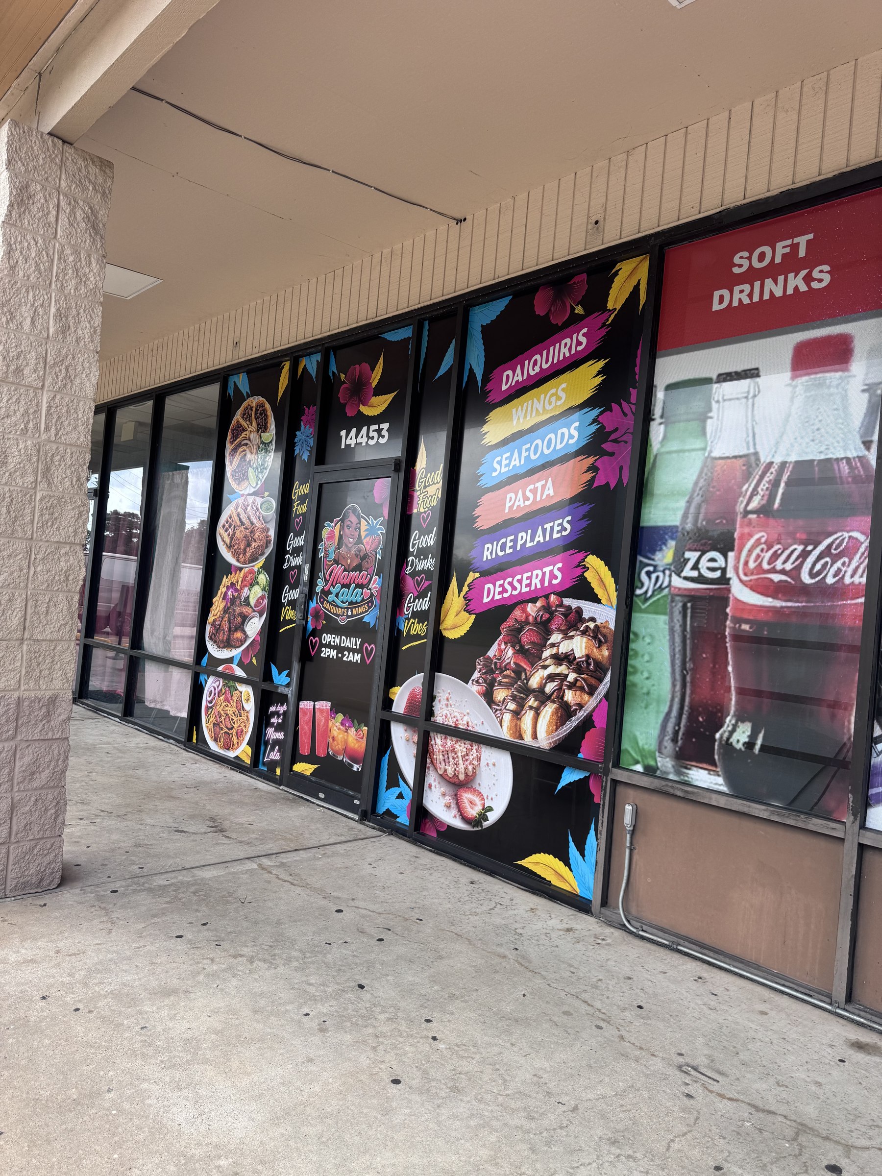 Full-height window graphics for Mama Lala in Houston, TX